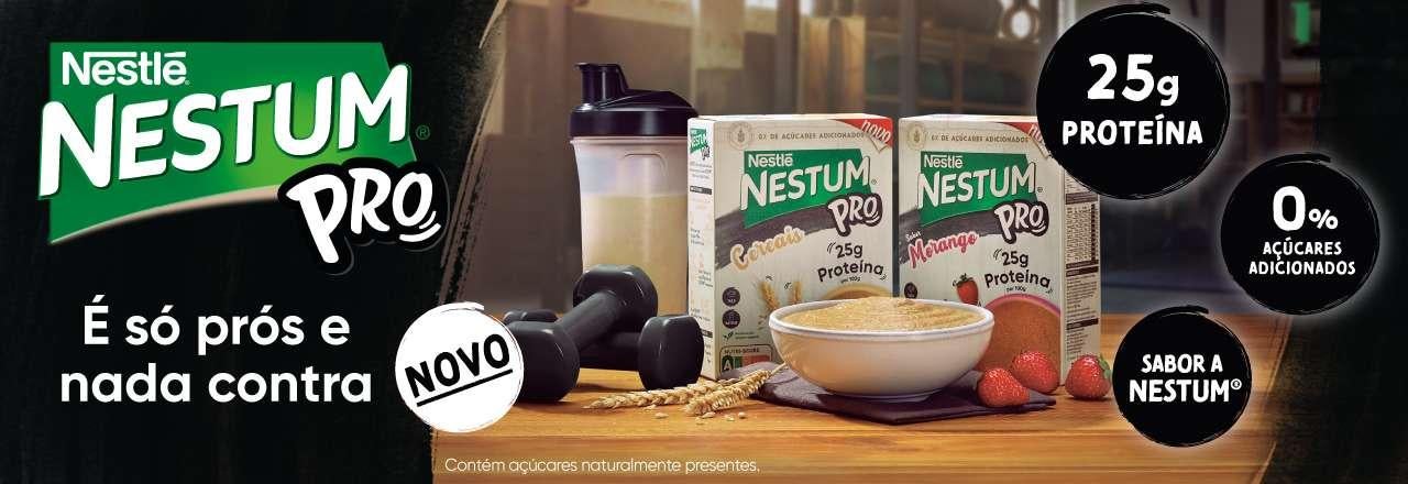 embalagem de nestum pro e dois halteres de ginásio